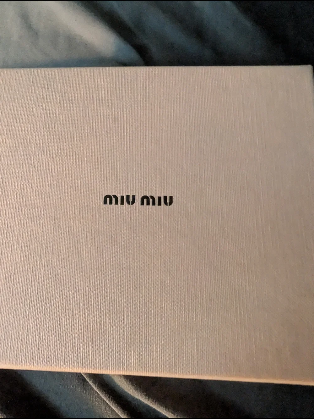 Miu Miu Black Pebbled Leather Zip-Around Wallet